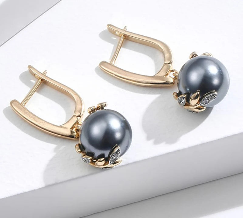 Sort Perle Øreringe med Gulddetalje