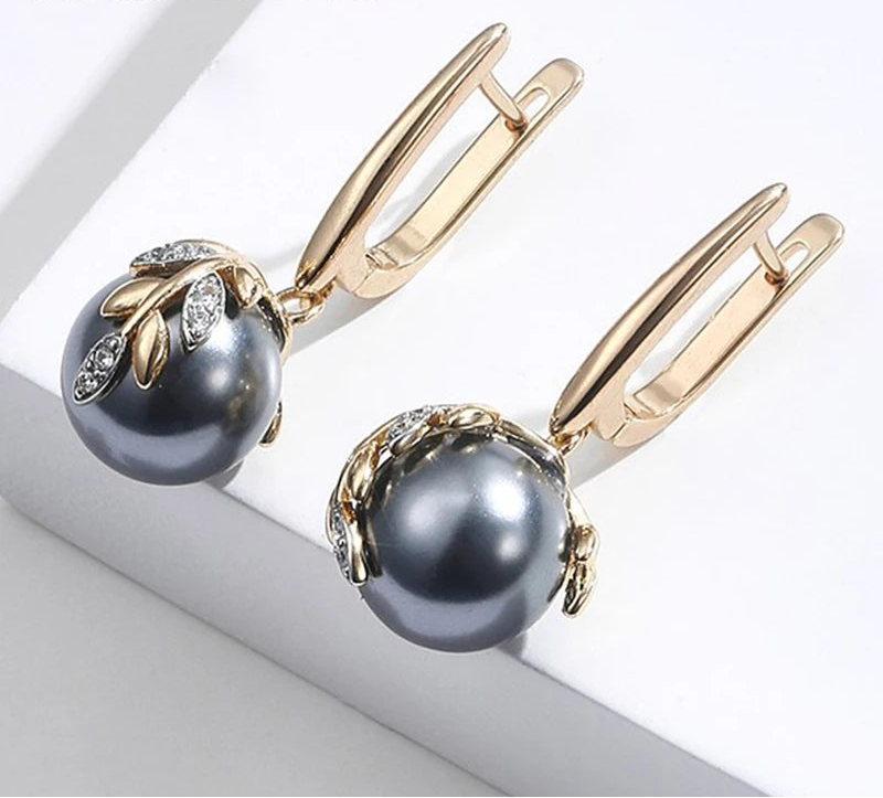 Sort Perle Øreringe med Gulddetalje