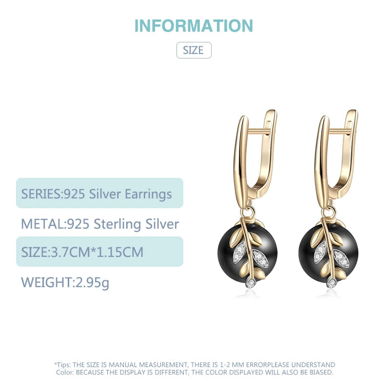 Sort Perle Øreringe med Gulddetalje