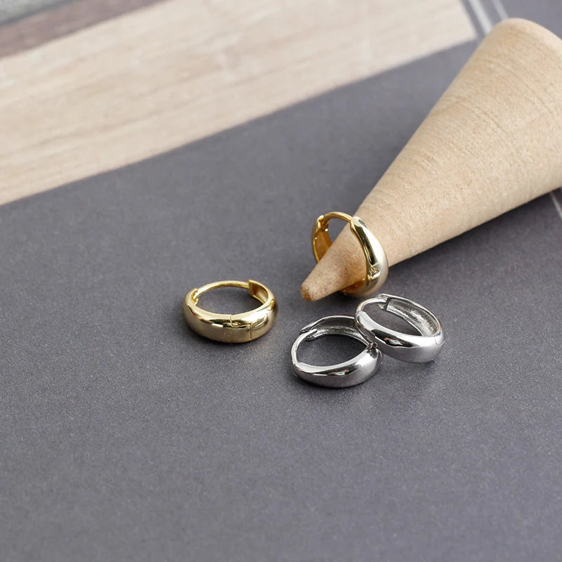 Brede Hoop Øreringe i Sterlingsølv og Guld