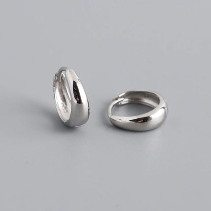 Brede Hoop Øreringe i Sterlingsølv og Guld