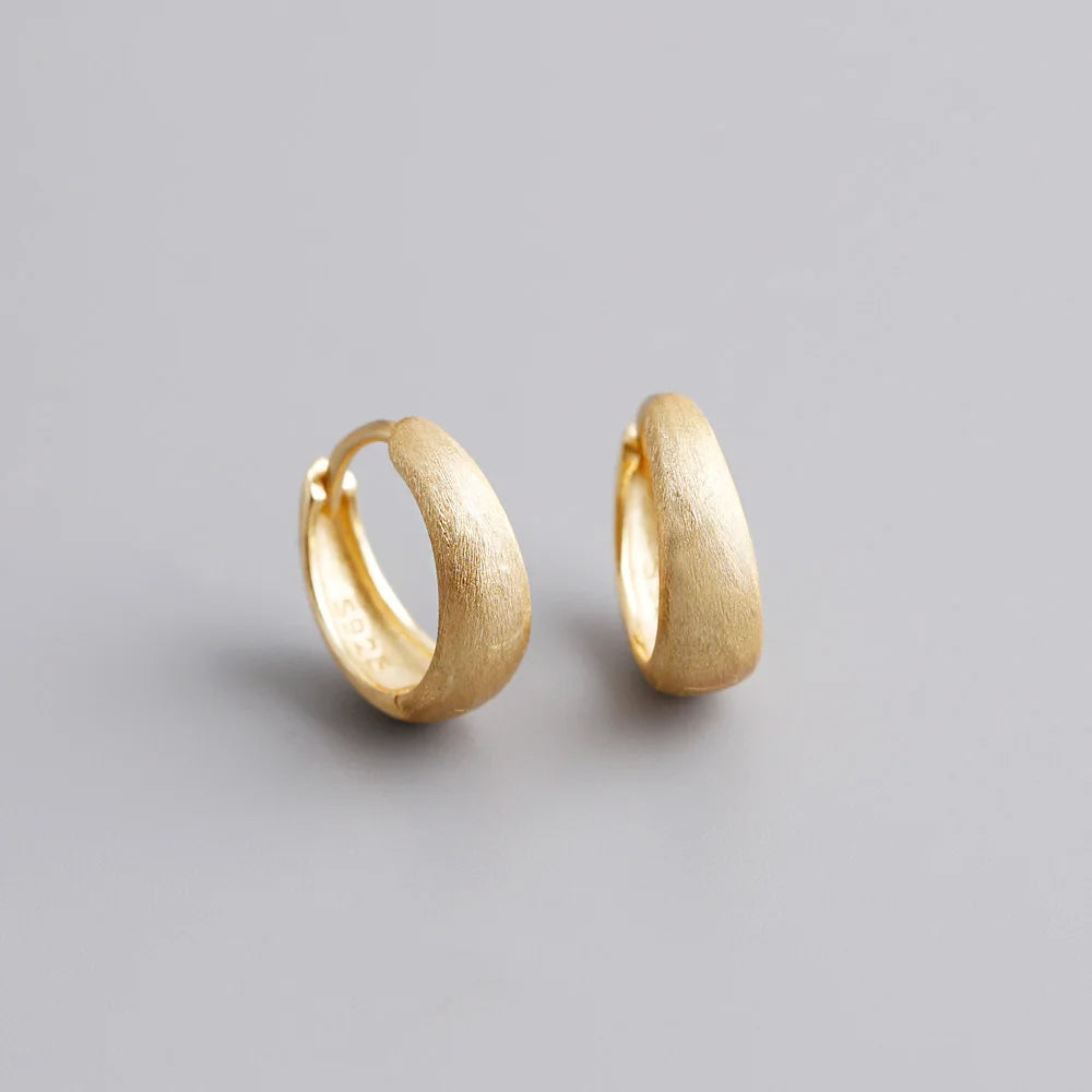 Brede Hoop Øreringe i Sterlingsølv og Guld